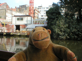 Mr Monkey looking at building works on the Leie