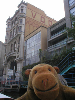 Mr Monkey looking up at the Vooruit building