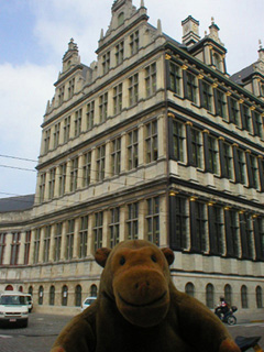 Mr Monkey looking at the town hall of Ghent