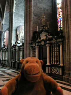 Mr Monkey looking at chapels on the north side of the apse