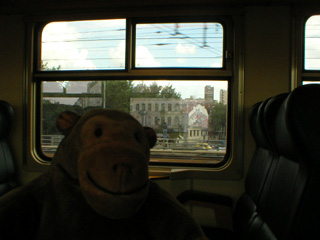 Mr Monkey on the train going through Brussels