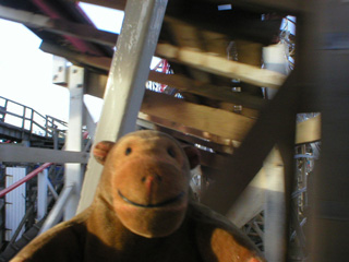 Mr Monkey going under a rollercoaster on the monorail