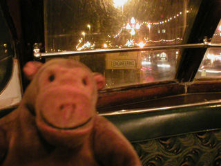 Mr Monkey looking at an engineering tram from the front seat of his tram