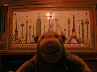 Mr Monkey looking the tiled plaque commemorating 100 years of the Blackpool Tower